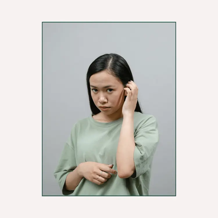 A Shy Woman in Green Shirt