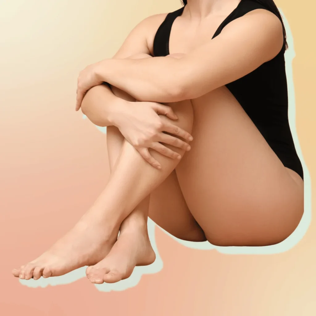 Body Positive Young Woman Sitting on orange gradient Background