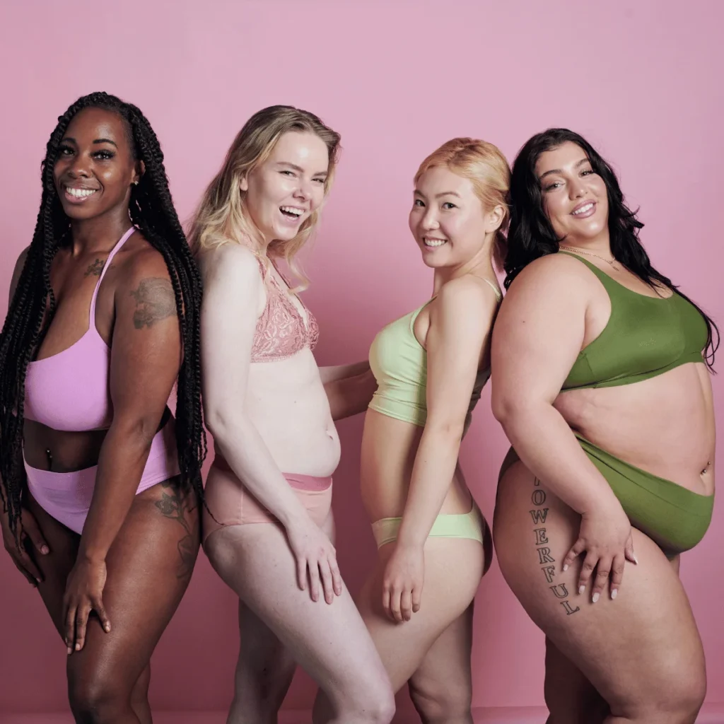 Four women posing. Body positive affirmations