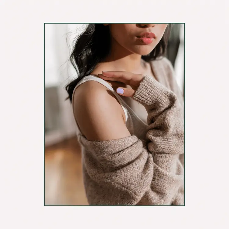 Woman Wearing a Knitted Cardigan and Tank Top.+Signs of blocked feminine energy