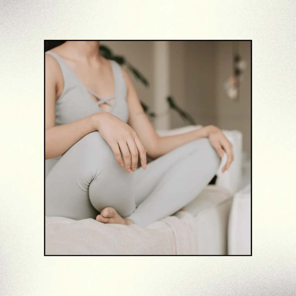 Woman Meditating at Home