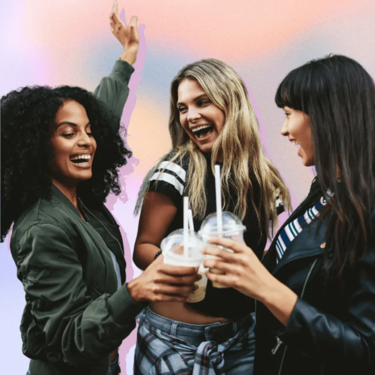 three-friends-holding-three-milkshakes-and-laughing.-How-to-make-friends-as-an-adult